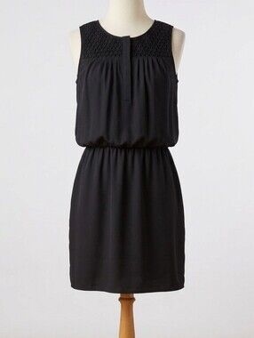 Jessica Simpson black sleeveless blouson dress w/ pockets size L.